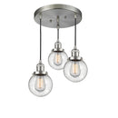 Beacon Multi-Pendant shown in the Brushed Satin Nickel finish with a Seedy shade