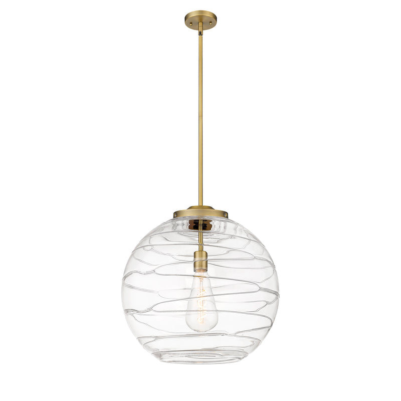 Deco Swirl Pendant shown in the Brushed Brass finish with a Clear shade