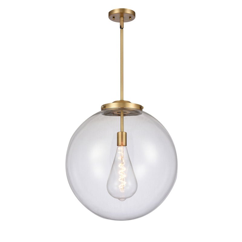 Beacon Pendant shown in the Brushed Brass finish with a Clear shade