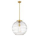 Deco Swirl Pendant shown in the Satin Gold finish with a Clear shade