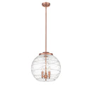 Deco Swirl Pendant shown in the Antique Copper finish with a Clear shade