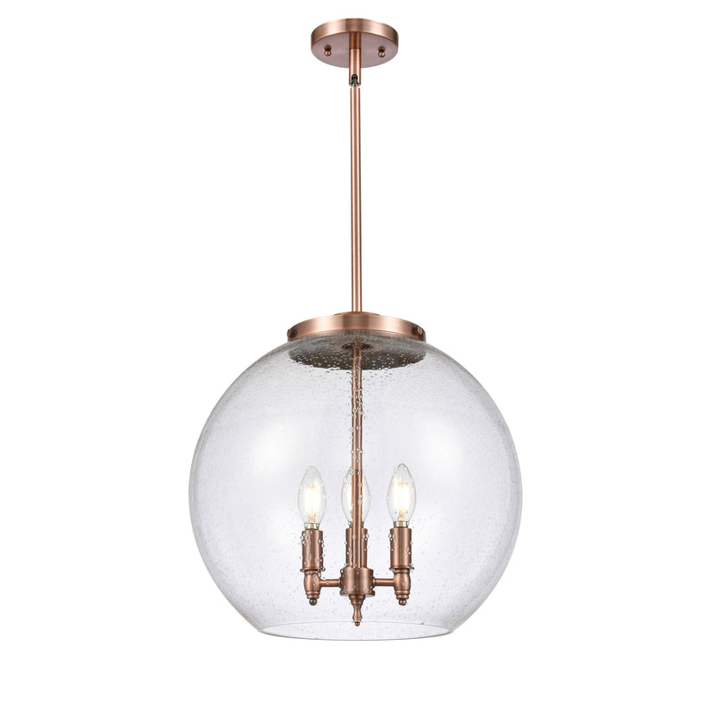 Athens Pendant shown in the Antique Copper finish with a Seedy shade