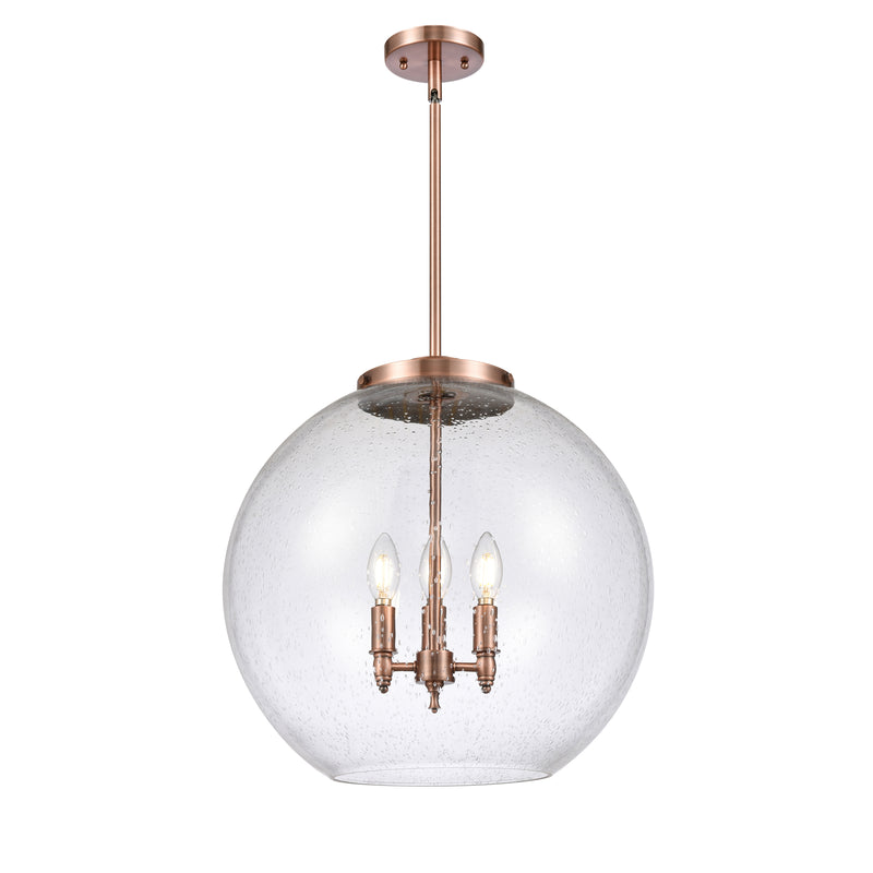 Athens Pendant shown in the Antique Copper finish with a Seedy shade