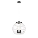 Deco Swirl Pendant shown in the Matte Black finish with a Clear shade