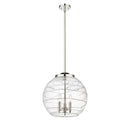 Deco Swirl Pendant shown in the Polished Nickel finish with a Clear shade