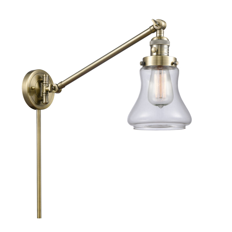 Bellmont Swing Arm shown in the Antique Brass finish with a Clear shade