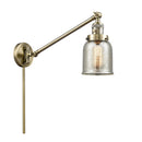 Bell Swing Arm shown in the Antique Brass finish with a Silver Plated Mercury shade