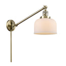 Bell Swing Arm shown in the Antique Brass finish with a Matte White shade