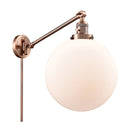 Beacon Swing Arm shown in the Antique Copper finish with a Matte White shade