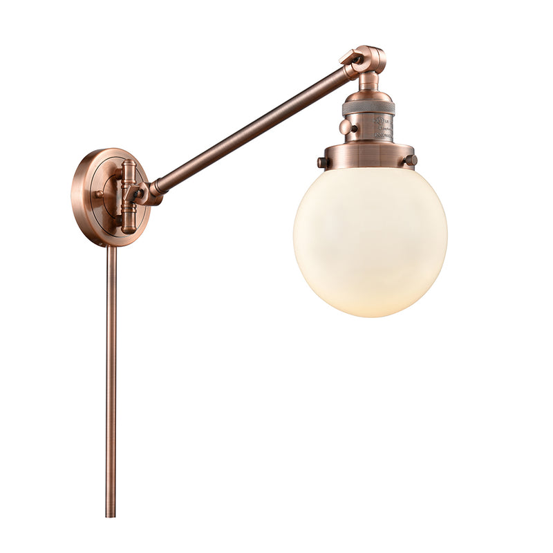 Beacon Swing Arm shown in the Antique Copper finish with a Matte White shade