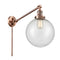 Beacon Swing Arm shown in the Antique Copper finish with a Seedy shade