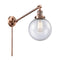 Beacon Swing Arm shown in the Antique Copper finish with a Seedy shade