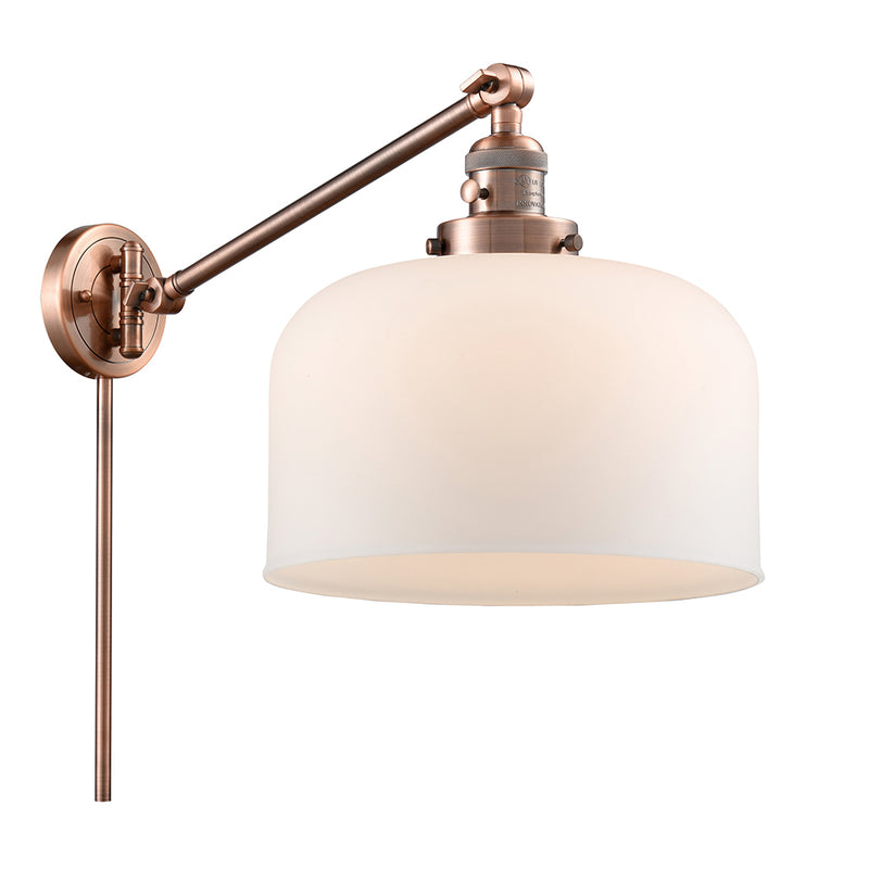 Bell Swing Arm shown in the Antique Copper finish with a Matte White shade