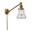 Bellmont Swing Arm shown in the Brushed Brass finish with a Clear shade