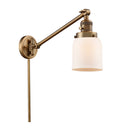 Bell Swing Arm shown in the Brushed Brass finish with a Matte White shade