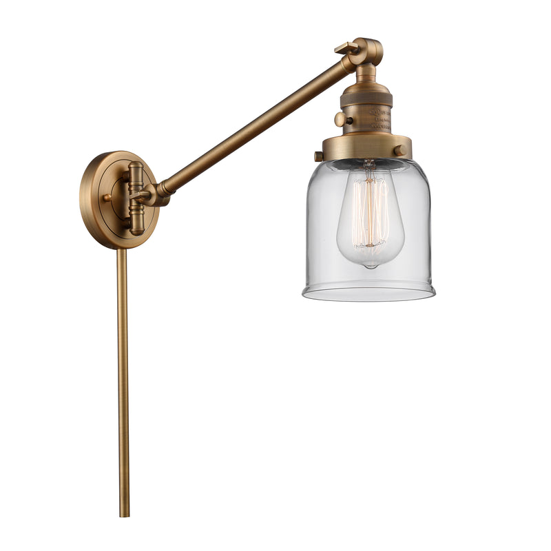 Bell Swing Arm shown in the Brushed Brass finish with a Clear shade