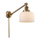 Bell Swing Arm shown in the Brushed Brass finish with a Matte White shade