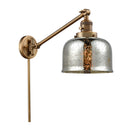 Bell Swing Arm shown in the Brushed Brass finish with a Silver Plated Mercury shade