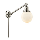 Beacon Swing Arm shown in the Polished Nickel finish with a Matte White shade