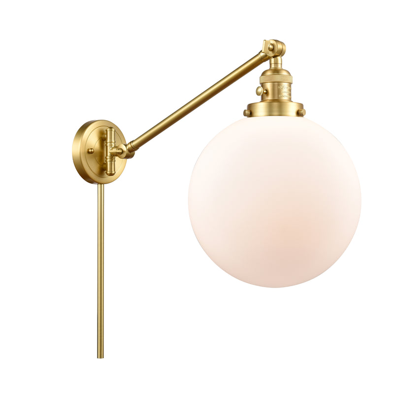 Beacon Swing Arm shown in the Satin Gold finish with a Matte White shade