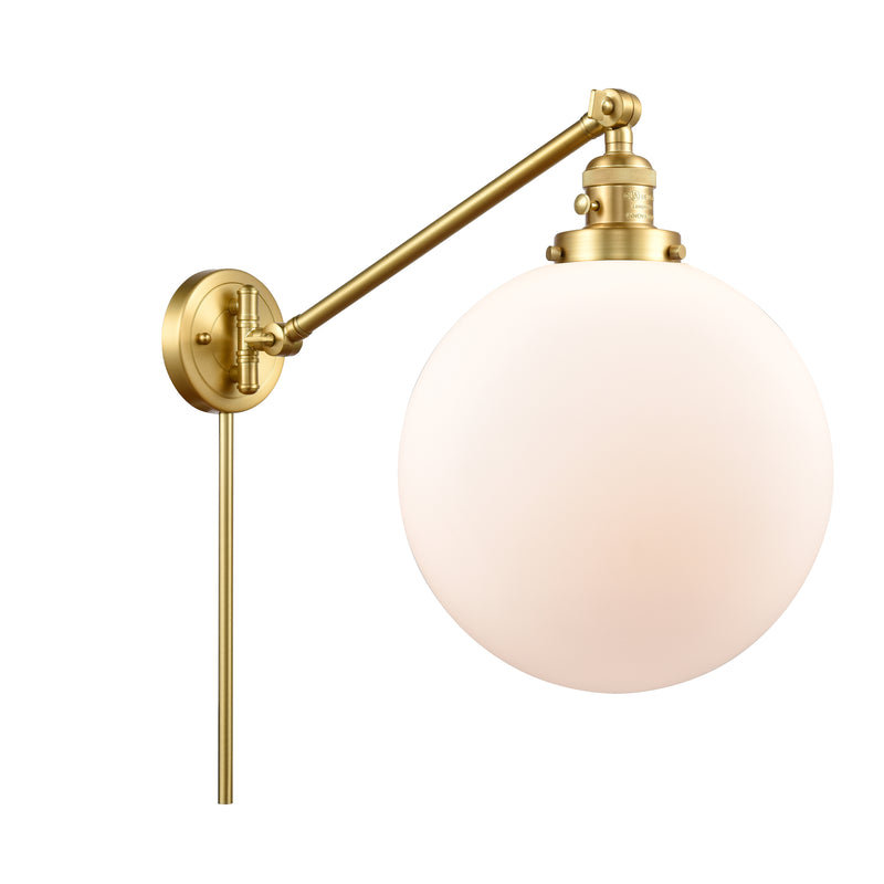 Beacon Swing Arm shown in the Satin Gold finish with a Matte White shade