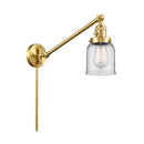 Bell Swing Arm shown in the Satin Gold finish with a Clear shade