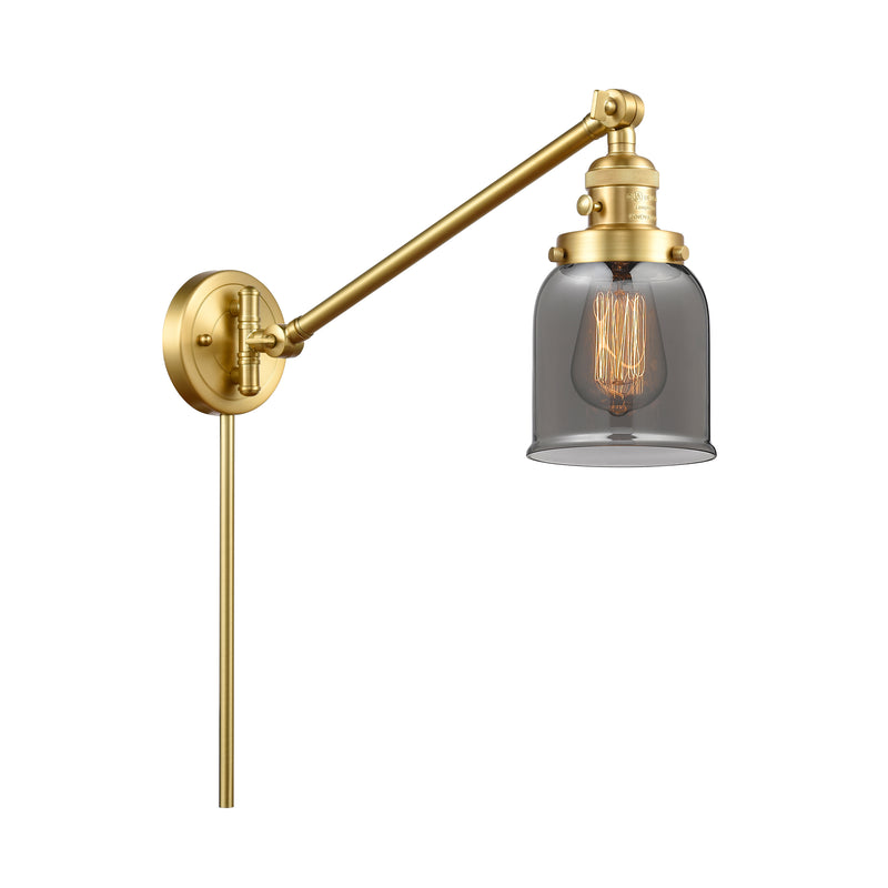 Bell Swing Arm shown in the Satin Gold finish with a Plated Smoke shade