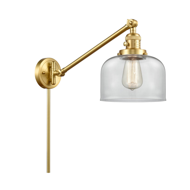 Bell Swing Arm shown in the Satin Gold finish with a Clear shade