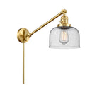 Bell Swing Arm shown in the Satin Gold finish with a Seedy shade