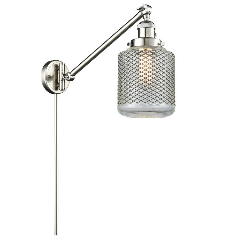 Stanton Swing Arm shown in the Brushed Satin Nickel finish with a Clear Wire Mesh shade