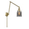 Bell Swing Arm shown in the Antique Brass finish with a Plated Smoke shade