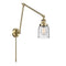 Bell Swing Arm shown in the Antique Brass finish with a Seedy shade