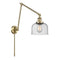 Bell Swing Arm shown in the Antique Brass finish with a Seedy shade