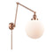 Beacon Swing Arm shown in the Antique Copper finish with a Matte White shade