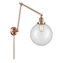 Beacon Swing Arm shown in the Antique Copper finish with a Clear shade