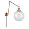 Beacon Swing Arm shown in the Antique Copper finish with a Clear shade