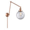 Beacon Swing Arm shown in the Antique Copper finish with a Clear shade