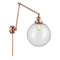 Beacon Swing Arm shown in the Antique Copper finish with a Seedy shade