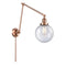 Beacon Swing Arm shown in the Antique Copper finish with a Seedy shade