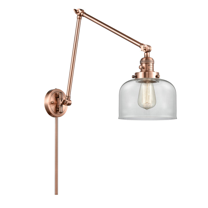 Bell Swing Arm shown in the Antique Copper finish with a Clear shade