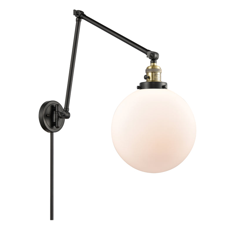 Beacon Swing Arm shown in the Black Antique Brass finish with a Matte White shade