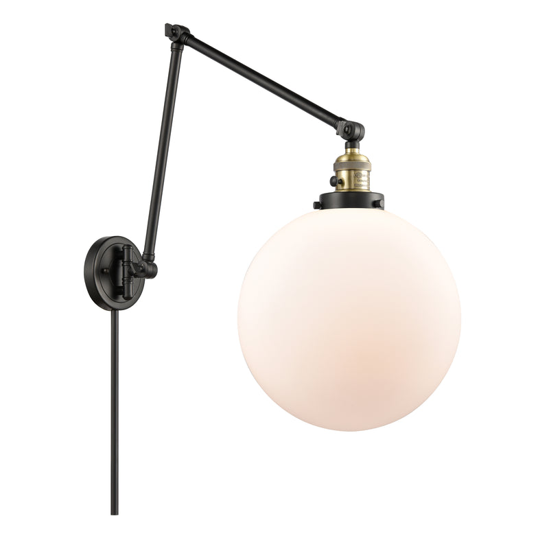 Beacon Swing Arm shown in the Black Antique Brass finish with a Matte White shade