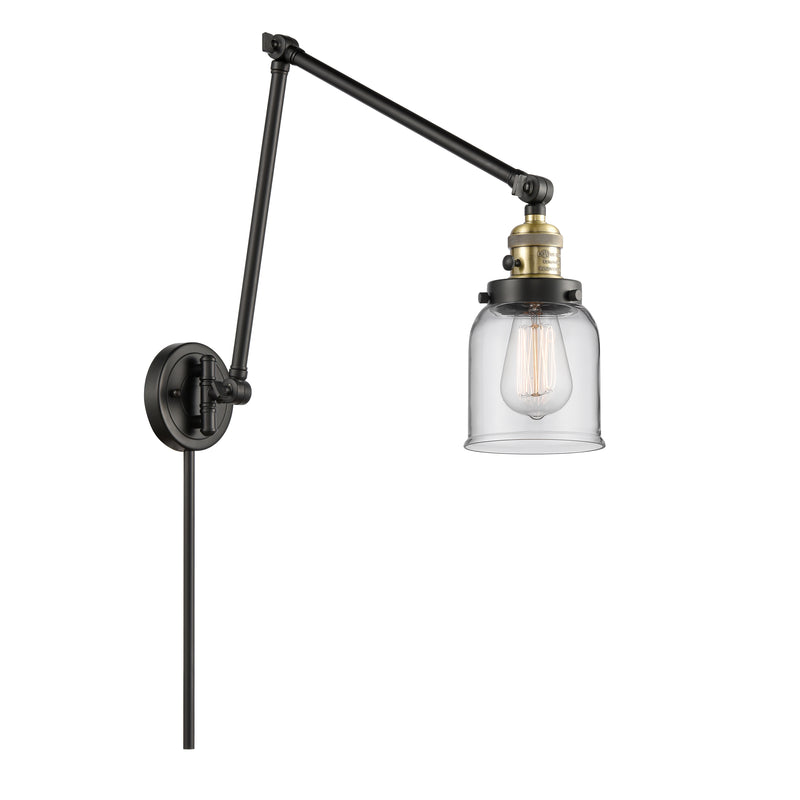 Bell Swing Arm shown in the Black Antique Brass finish with a Clear shade