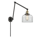 Bell Swing Arm shown in the Black Antique Brass finish with a Clear shade