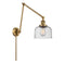 Bell Swing Arm shown in the Brushed Brass finish with a Seedy shade