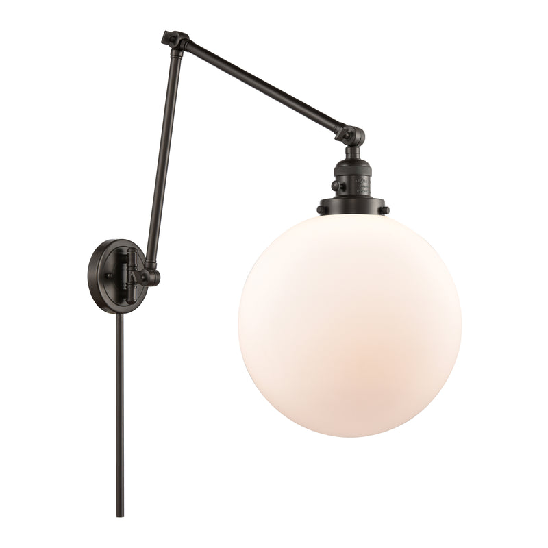 Beacon Swing Arm shown in the Oil Rubbed Bronze finish with a Matte White shade