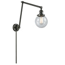 Beacon Swing Arm shown in the Oil Rubbed Bronze finish with a Seedy shade