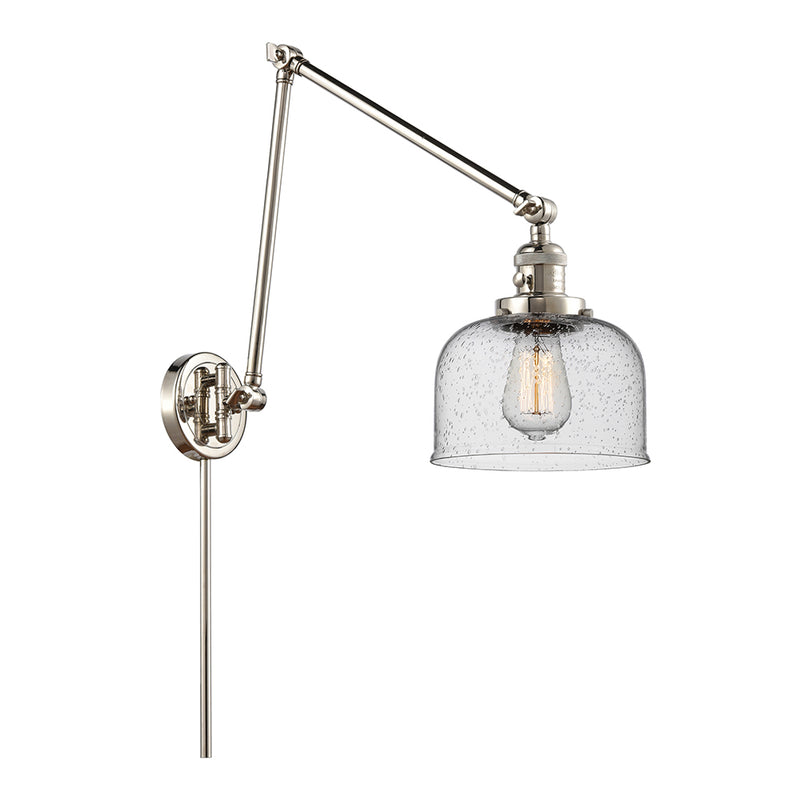 Bell Swing Arm shown in the Polished Nickel finish with a Seedy shade