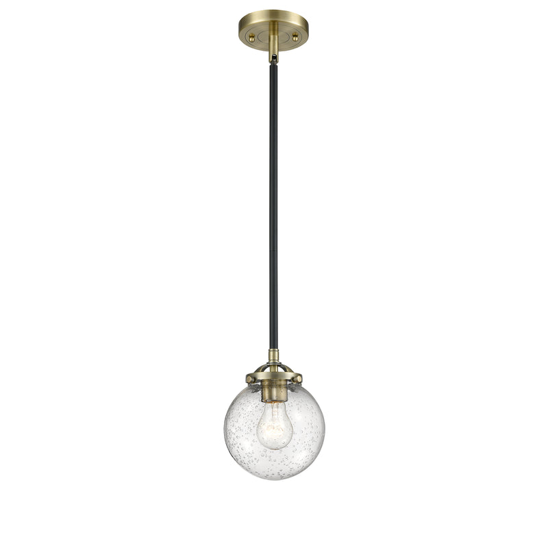 Beacon Mini Pendant shown in the Black Antique Brass finish with a Seedy shade