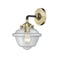 Oxford Sconce shown in the Black Antique Brass finish with a Clear shade